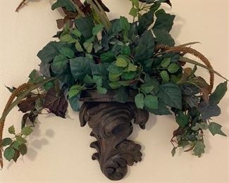 Wall pocket with faux greenery