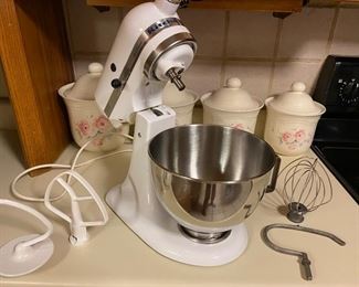 White KitchenAid stand mixer with attachments