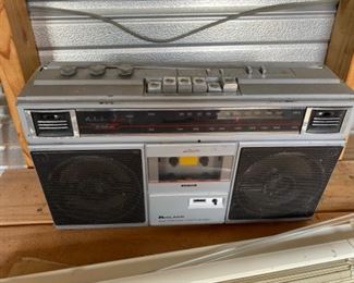 “Boom box” portable AM/FM radio with cassette player