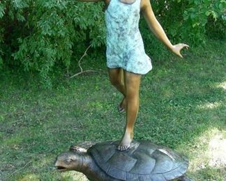 Bronze sculpture/fountain  of young girl standing on turtle