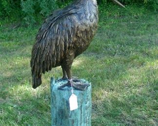 Bronze sculpture/fountain of pelican on post