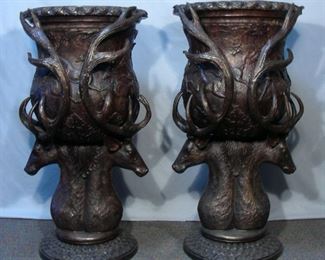 Pair of fabulous large deer motif bronze urns