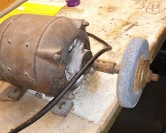 Sold Vintage Anaconda Copper and Cable Co. Electric Motor, with 6 inch diameter grinding Wheel, please bring your own tools to remove it from the workbench,