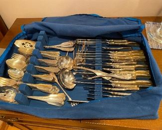 Silver plate set with serving pieces by Community