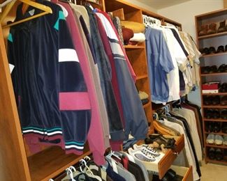 walk-in closet full of quality men's clothing and shoes