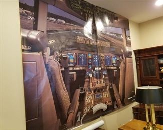 large 2 piece wall hanging of Boeing airplane cockpit.  Also 1 of a Lear jet