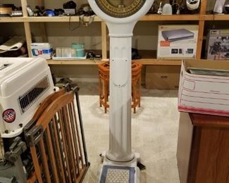 Antique "Peerless Perfect Balance Your Weight One Cent" scale.  Ceramic tile platform. Porcelain plaque of policeman missing. . : 69" high overall x 24" deep x 14" wide. Dial 15".  Circa 1930.  $1,000