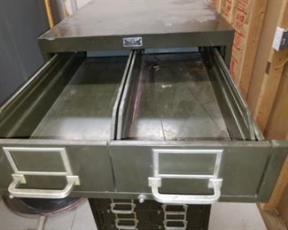 HEAVY metal cabinet, fireproof, lined with lead.  If considering buying this, YOU must bring several strong people to help YOU move it out of basement.  Must go up 6 exterior concrete steps..  Bring a heavy duty handtruck and several people.  We will NOT assist. 