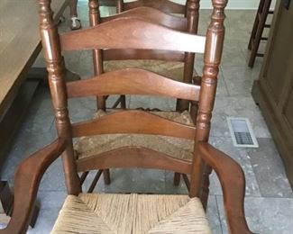 65- Nichols & Stone Set of 8 Ladder Back Chairs 2 Arms. 6 Sides. Rush Seats. Very Sturdy. 42” h x 20 wide $489 Set Chairs are Sold