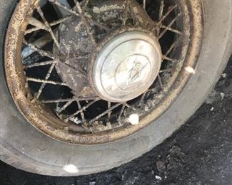 Spoke Wheel and Hub Cap from vintage Ford car