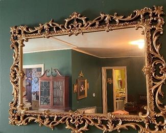 Large gilded gold framed mirror.  Lightweight, though :-)