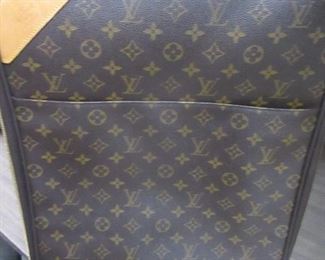 LOUIS VUITTON ROLLING SUITCASE