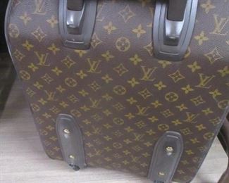 LOUIS VUITTON BACK OF ROLLING SUITCASE