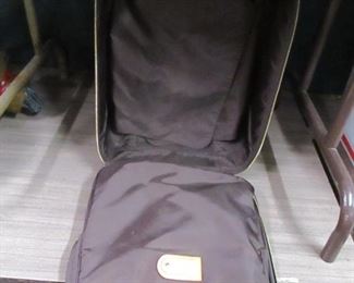 LOUIS VUITTON INSIDE OF SUITCASE
