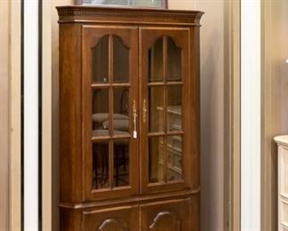 This is actually a corner cabinet that can also be used facing forward.  Very nice!