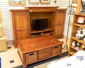Two very nice pieces!  The coffee table has drawers and storage on both sides.