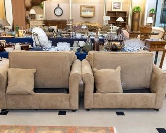 These two over sized chairs are actually twin hide-a-beds!