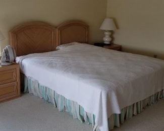 Bedroom set includes king bed, two nightstands, armoire, double dresser with two mirrors