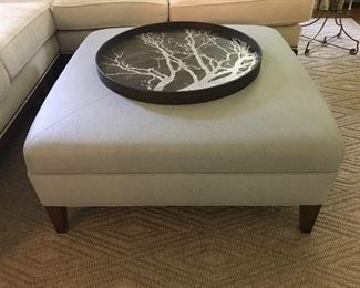 Kravet ottoman in Petra Ultraleather Plus, Embossed: Reptile blue/gray. Notre Monde painted tray.