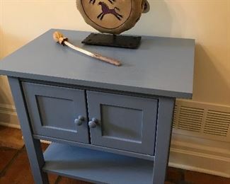 Crate and Barrel blue storage table.