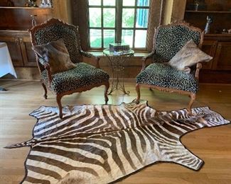Authentic Zebra hide rug, hair on hide pillows, upholstered cheetah print Harden furniture