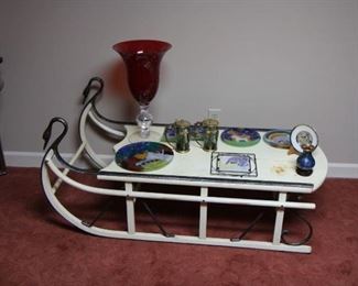 Sled table with swan accent