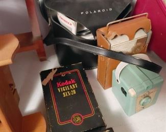 polaroid camera and other cameras