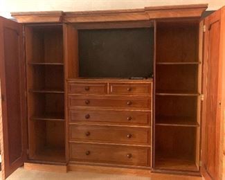 oversized wardrobe unit (breaks down into three sections) measures 68" t x 105" w x 26" d. 