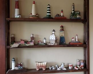 Collection of lighthouses and porcelain figurines