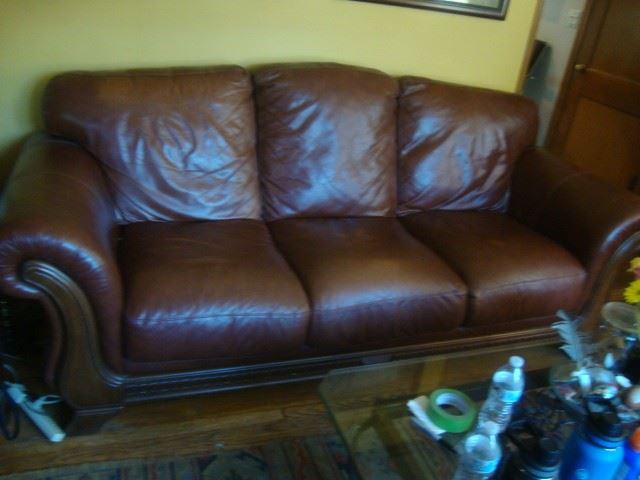 Leather sofa with wood trim