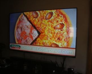 Large flat screen TV (Sarpino's Pizza ad)