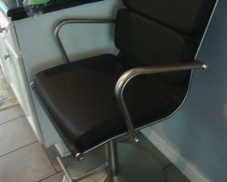 Barber's chair with chrome base