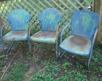 Motel patio chairs with old blue paint