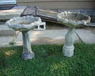 2 concrete bird baths