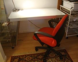 Aluminum and glass table/desk with red office chair