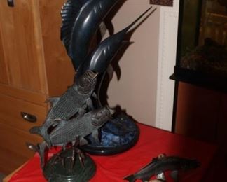 Bronze signed Marlin/Swordfish family. This item will be listed in an online auction prior to the sale. Here is a link for the auction https://www.estatesales.net/CA/Yuba-City/95991/2634222 If those items do not sell they will be included in this sale 