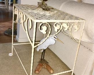 Metal side table, carved wooden seagull