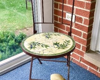 Decorative tile metal chair, carved wooden bird