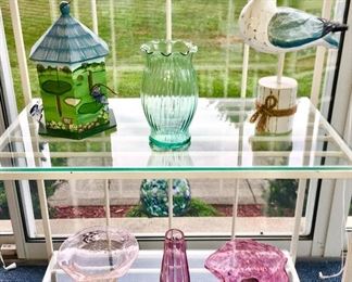 Metal stand w/ glass shelves, decorative collectibles