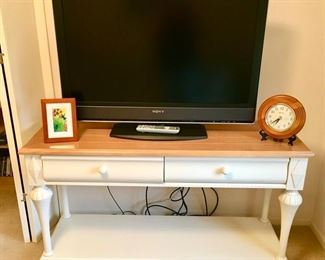 Painted table w/ stained wood top, flat screen TV