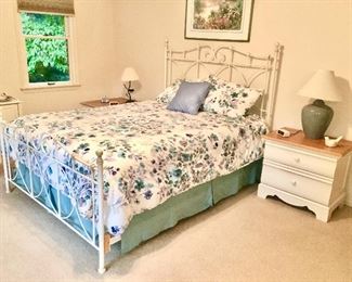 Wrought iron queen size bed, nightstands, lamps, signed artwork, etc.