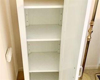 Inside of white cabinet