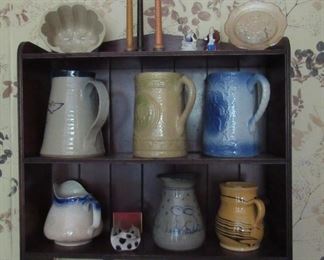 Shelf of old mugs