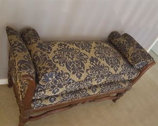 end of the bed bench nicely upholstered.