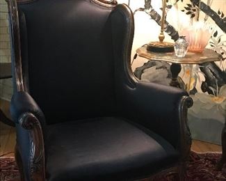 Early 1910 hand carved Italian walnut armchairs with deep navy silk fabric.