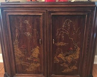 1950s Asian influence two door chest.