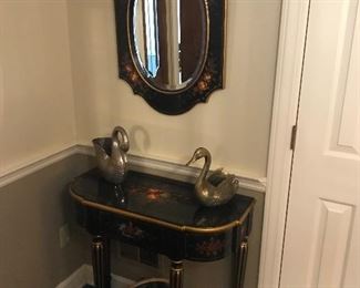Floral and black lacquer console and mirror