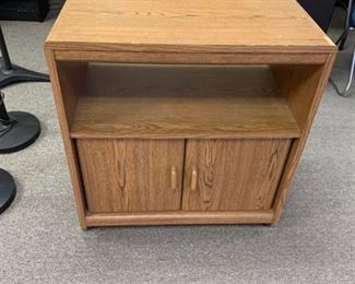 Small TV cabinet approximately 26 inches wide by 15 1/2 inches deep and 28 1/2 inches high