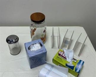 Assorted kitchen items, napkin holders and trashbags