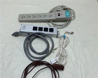 Assorted extension cords and power strips